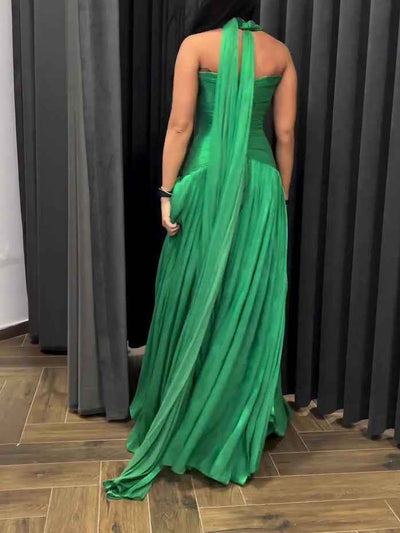 Emerald Green Plunging Neckline Gown With Pleated Skirt And Side Slit