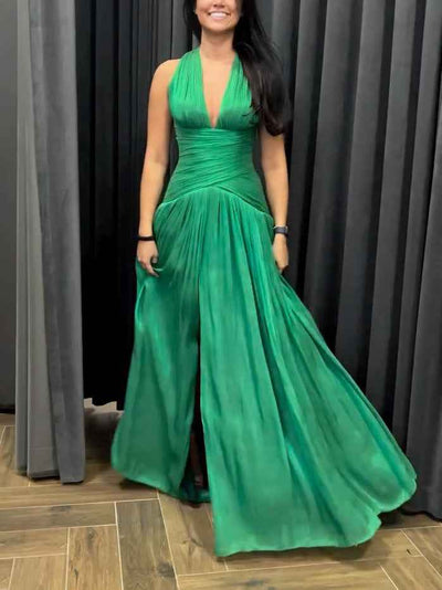 Emerald Green Plunging Neckline Gown With Pleated Skirt And Side Slit